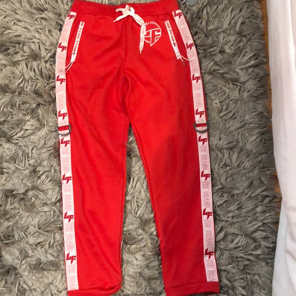 Red lf the brand joggers